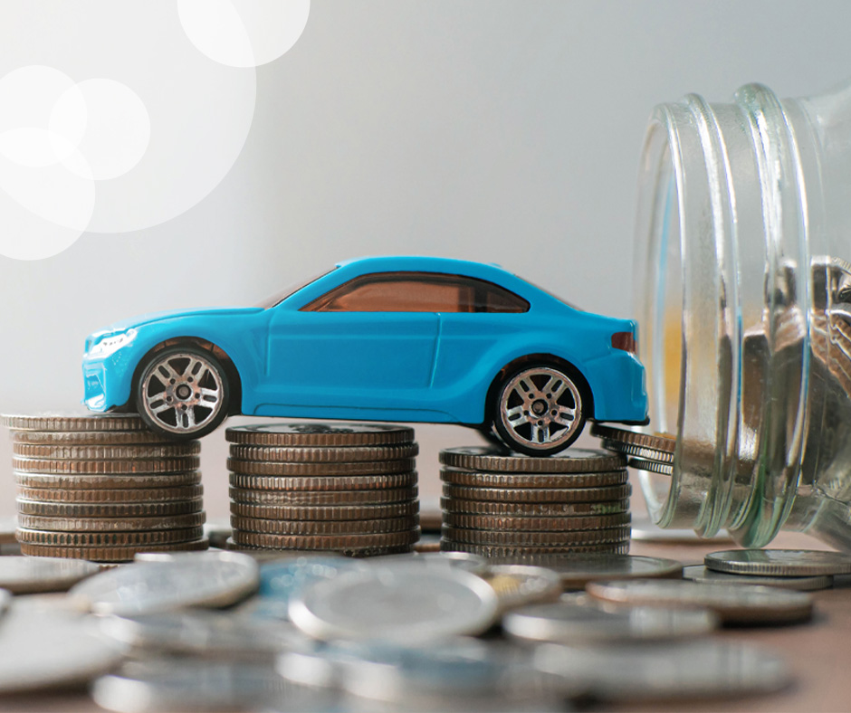 Blue toy car on stack of coins